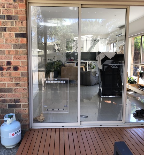 Large Dog Door installed in glass window in Balnarring.